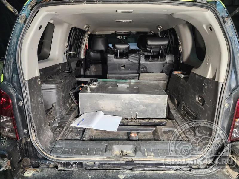 Как построить автоспальник вокруг дополнительного топливного бака